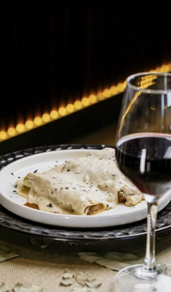 Canelones rellenos de carrilleras ibéricas con bechamel